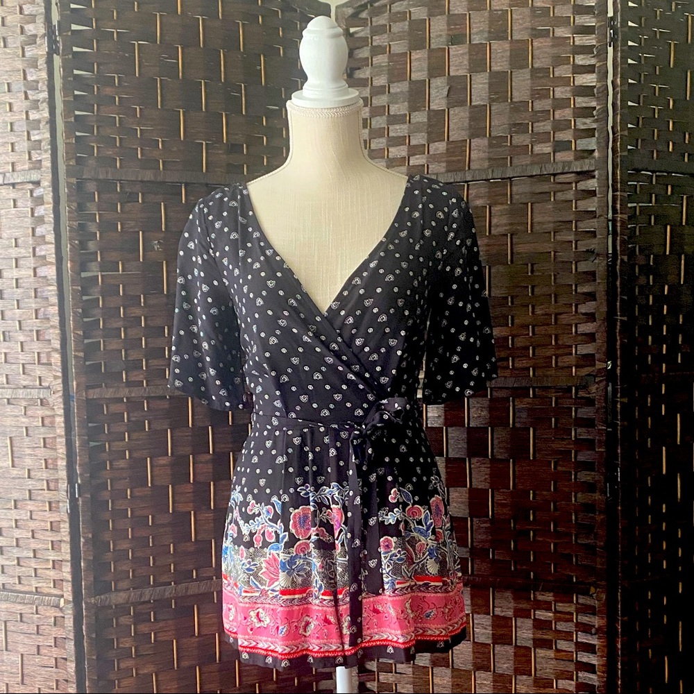 Beautiful romper with back opening detail